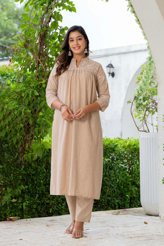 Kurta Nude Silk Blend Solid Embroidered Flared Suit Set