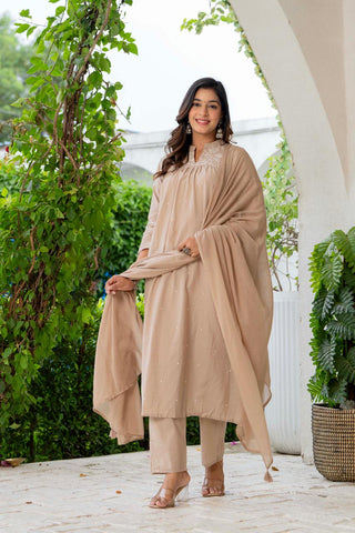 Kurta Nude Silk Blend Solid Embroidered Flared Suit Set