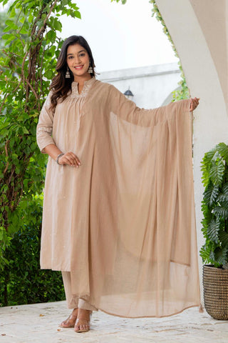 Kurta Nude Silk Blend Solid Embroidered Flared Suit Set