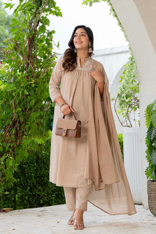 Kurta Nude Silk Blend Solid Embroidered Flared Suit Set