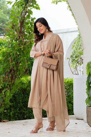 Kurta Nude Silk Blend Solid Embroidered Flared Suit Set